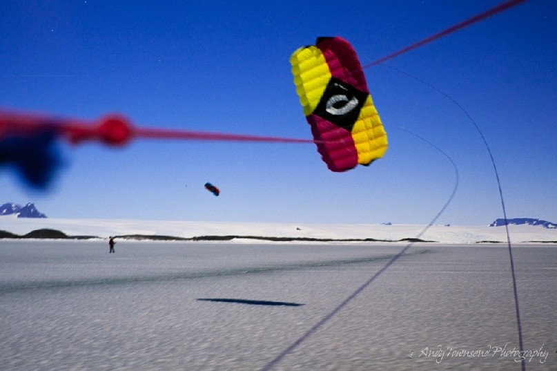 In relatively calm winds it's possible to slow the movement of this kite (quadrifoil) down to photograph it whilst on skis.<br />
<br />
Kite skiing is a relatively recent development of skiing where the pull comes from a kite. It can be done on water, snow or on land.