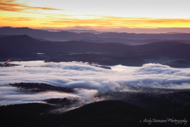 A 'bridgewater jerry' fog rolls over Hobart in the pre-dawn light.
