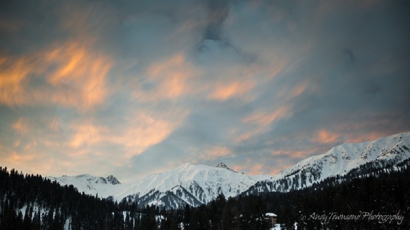 The last of the evening light catches high clouds above the Gulmarg mountain ranges.