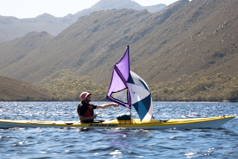 With the relatively recent introduction of sailing to sea kayaking, it's become possible to travel with very little effort. Umbrellas add to the excitement.